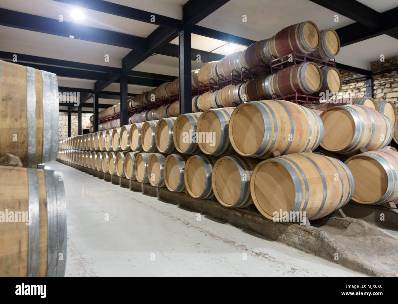 Interior of contemporary winery with wooden barrels Stock Photo - Alamy