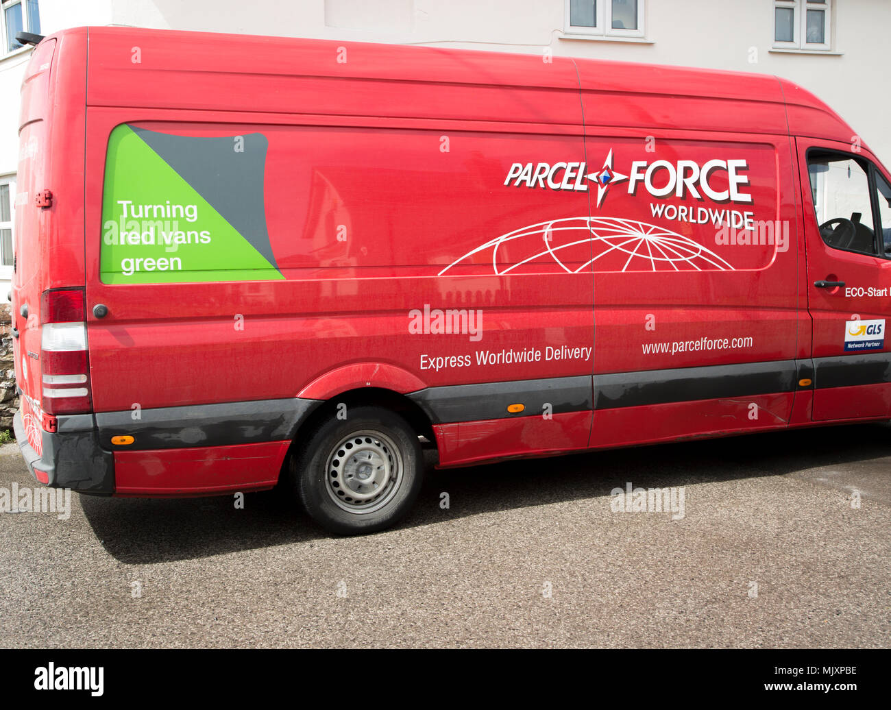 Red Parcelforce Worldwide Mercedes-Benz Sprinter delivery van using green  Eco-Start energy, Wiltshire, England, Uk Stock Photo - Alamy