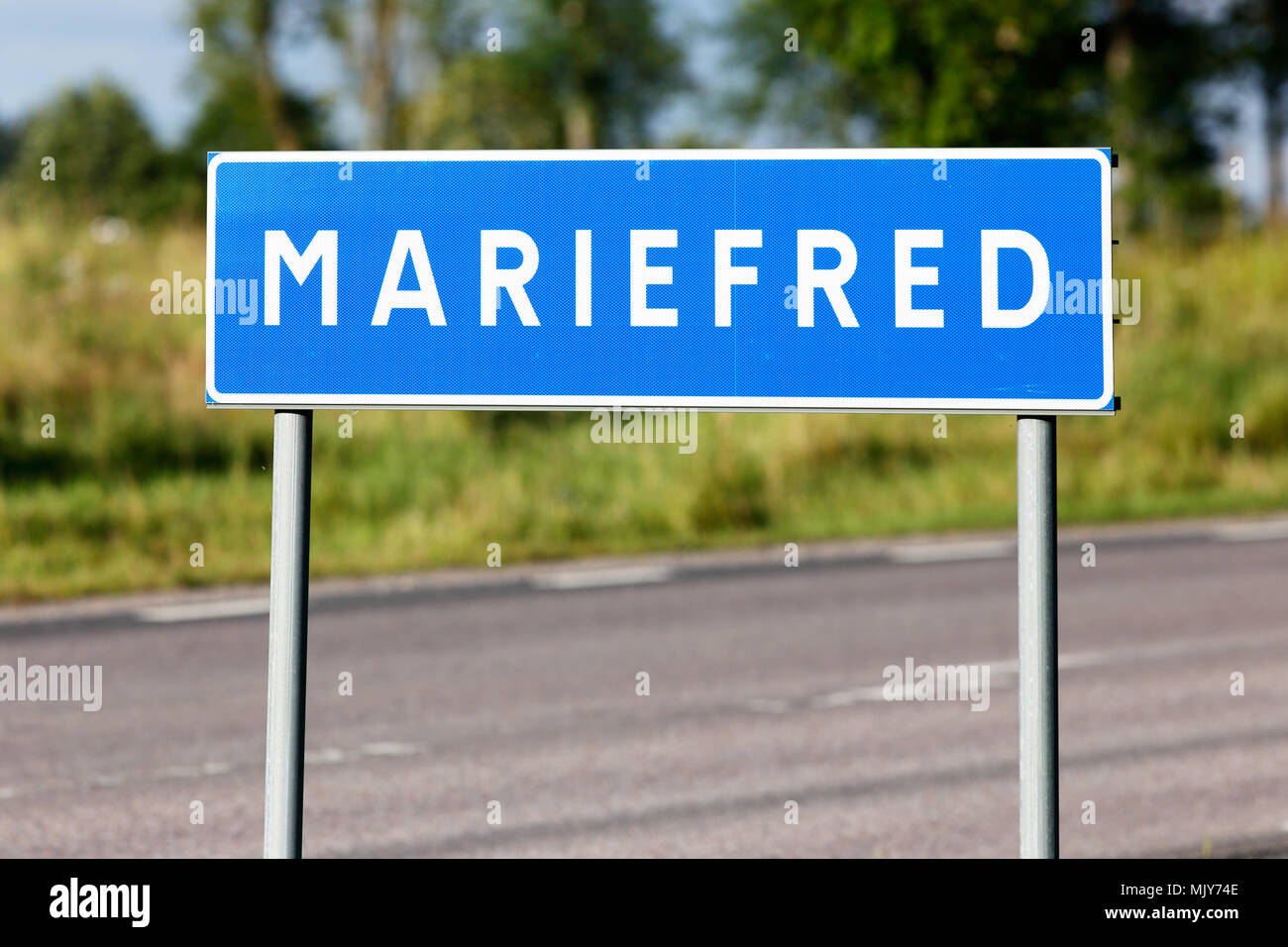 Road sign with te name of the Swedish town Mariefred. Stock Photo