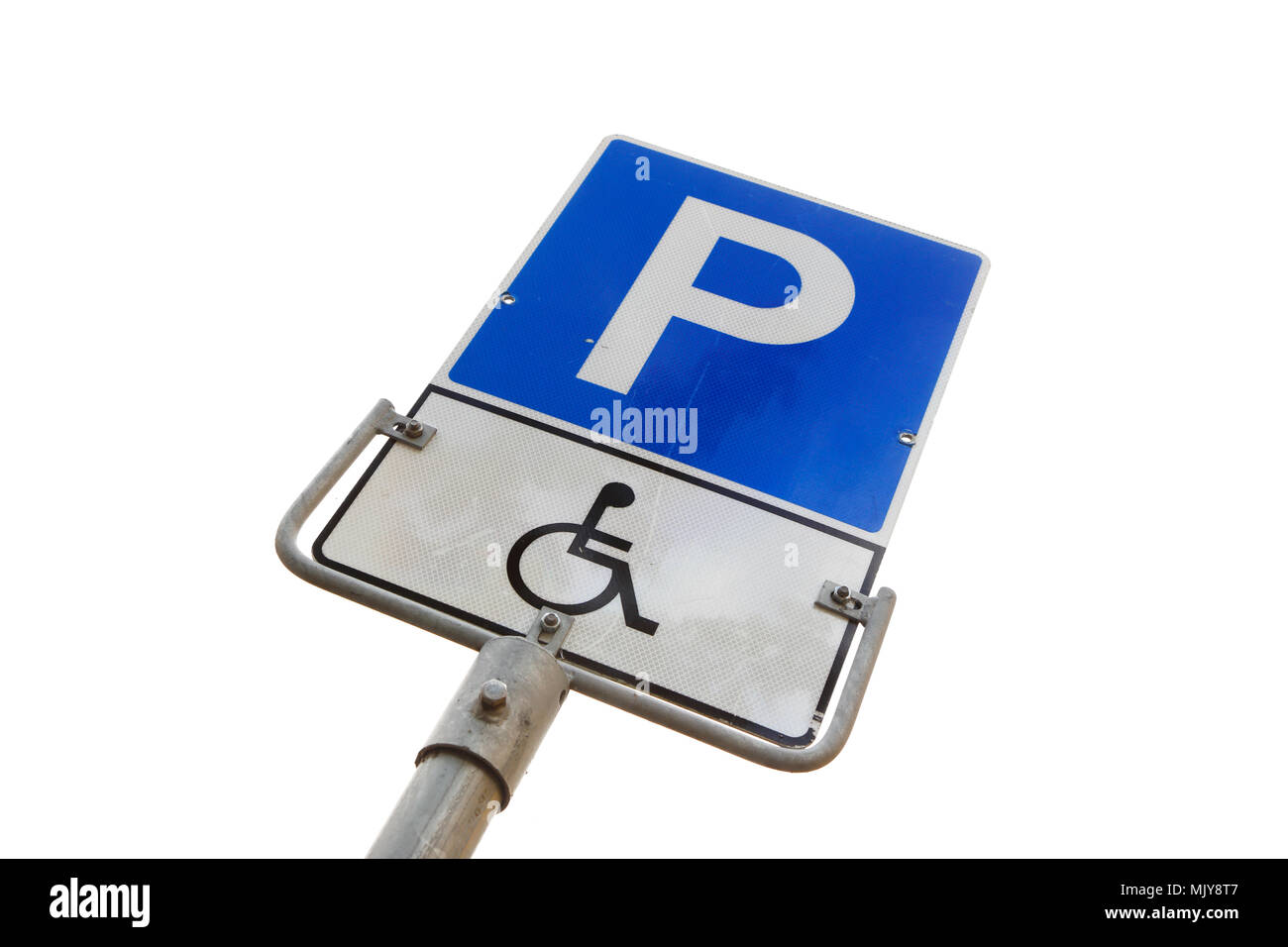 Norwegign road signs at the parking space reserved for disabled persons. Stock Photo