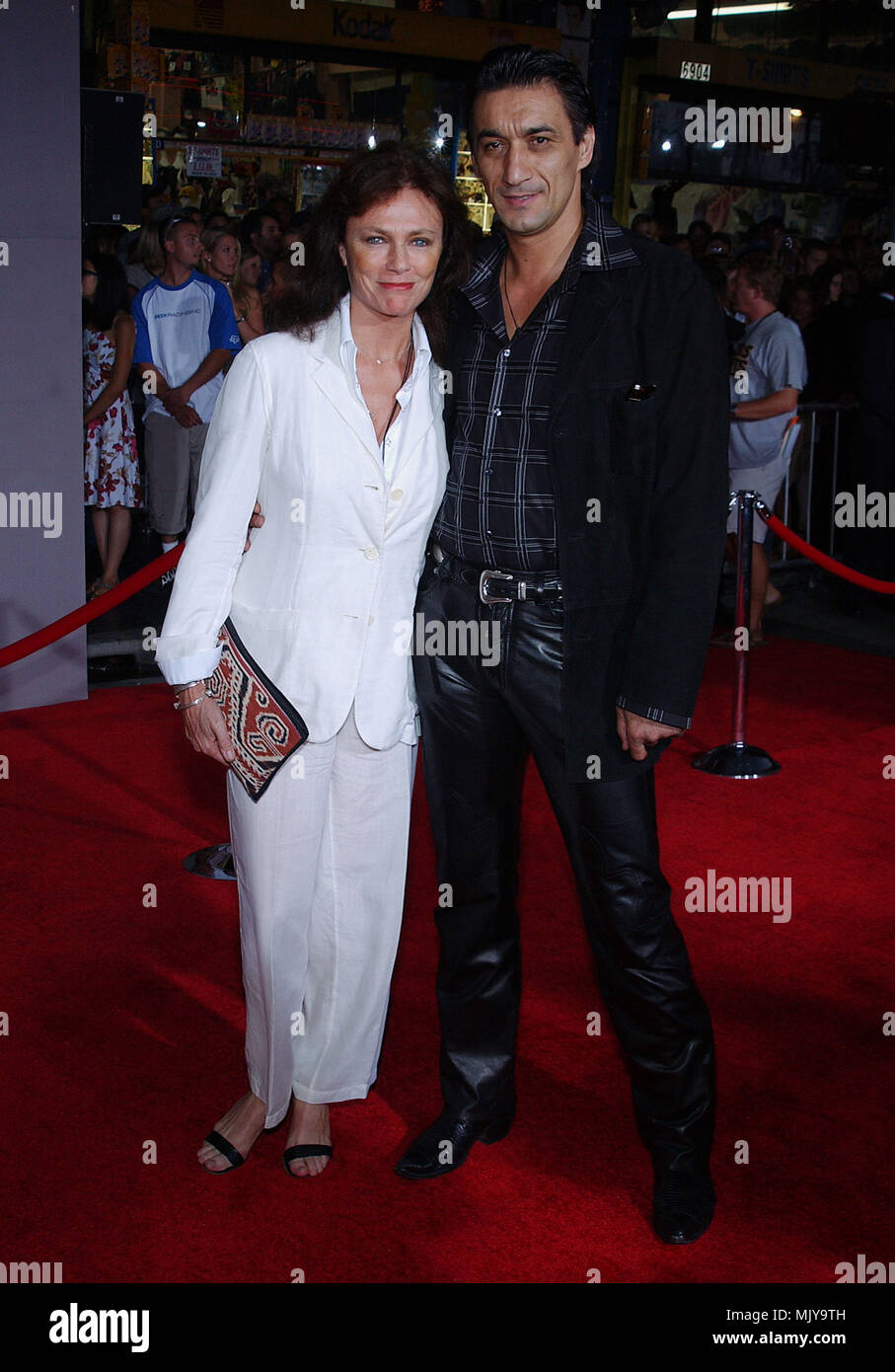 Jacqueline Bisset and Emin Boztepe arriving at the Premiere of ' Cold Creek Manor ' at the El Captain Theatre in Los Angeles. September 17, 2003          -            BissetJacq BoztepeAmin001.JPG           -              BissetJacq BoztepeAmin001.JPGBissetJacq BoztepeAmin001  Event in Hollywood Life - California,  Red Carpet Event, Vertical, USA, Film Industry, Celebrities,  Photography, Bestof, Arts Culture and Entertainment, Topix Celebrities fashion /  from the Red Carpet-, Vertical, Best of, Hollywood Life, Event in Hollywood Life - California,  Red Carpet , USA, Film Industry, Celebritie Stock Photo
