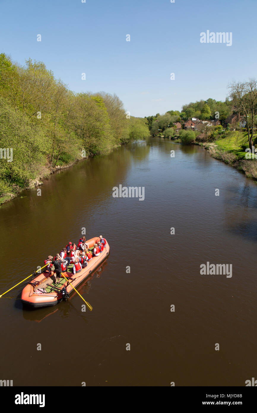The River Severn in Jackfield, Shropshire, England, with a rigid inflatable boat full of passengers. Stock Photo