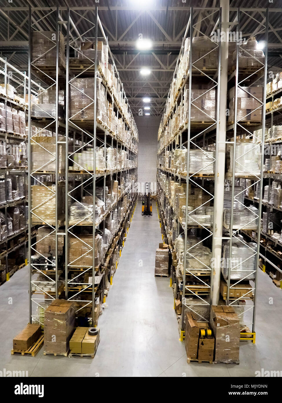 Large modern blurred warehouse industrial and logistics companies