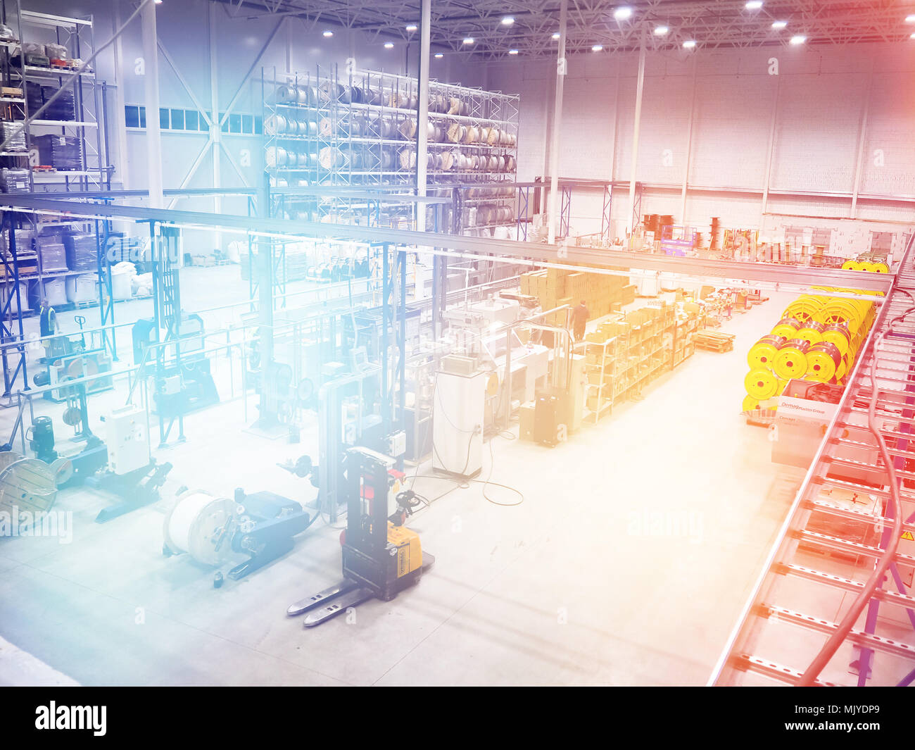 Large modern blurred warehouse industrial and logistics companies