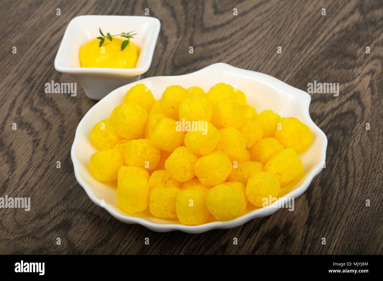 Cheese corn balls with sauce Stock Photo Alamy
