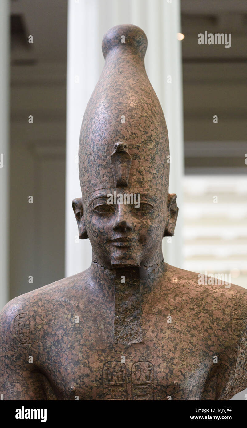 London. England. Statue of Egyptian Pharaoh Thutmose III wearing the white crown of upper Egypt (Hedjet) ca. 1479-1425 BC, Stock Photo