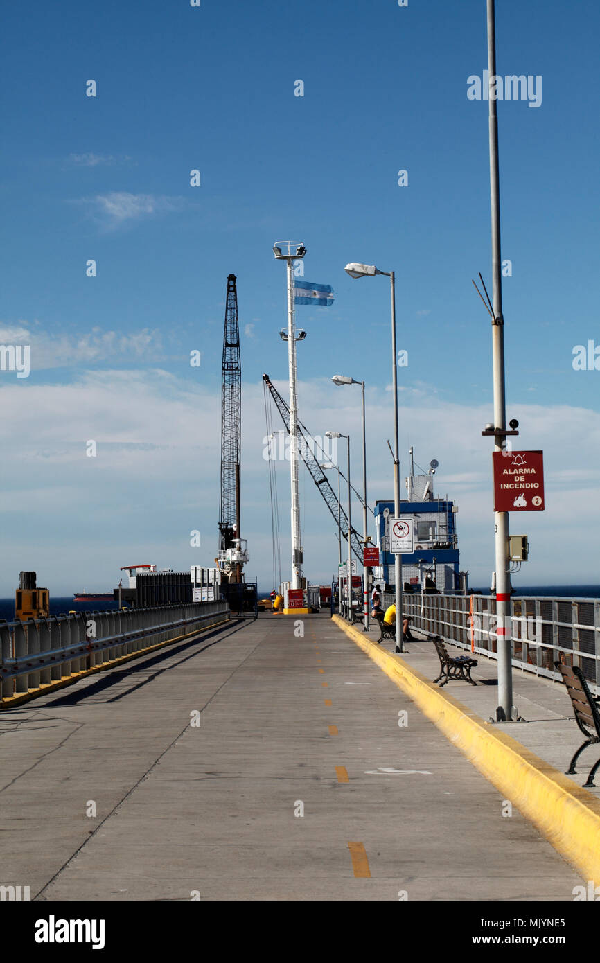 Puerto Madryn pier used for shipping, container deliveries and trade. Publicly accessible. Chubut Argentina, Patagonia, Stock Photo