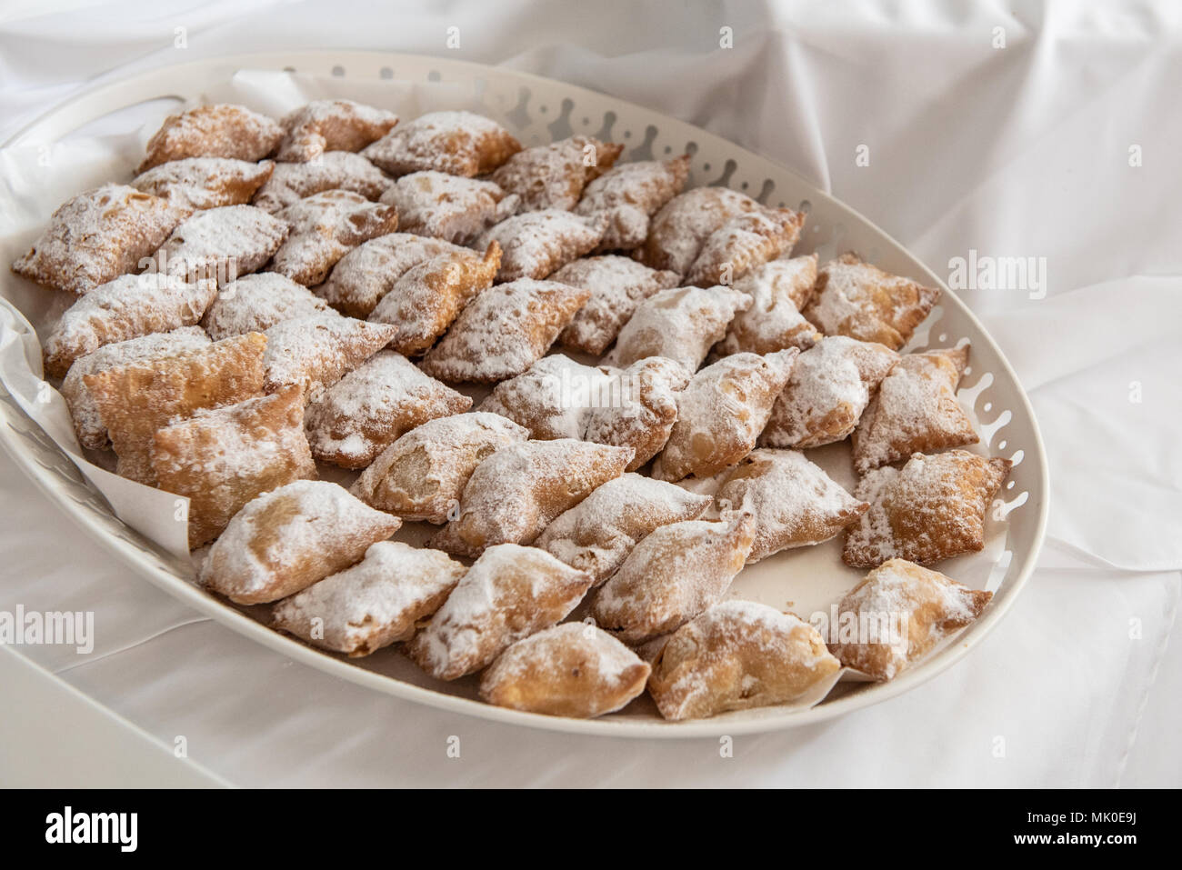 Delicious Greek traditional pastries filled with cheese called pourekia Stock Photo