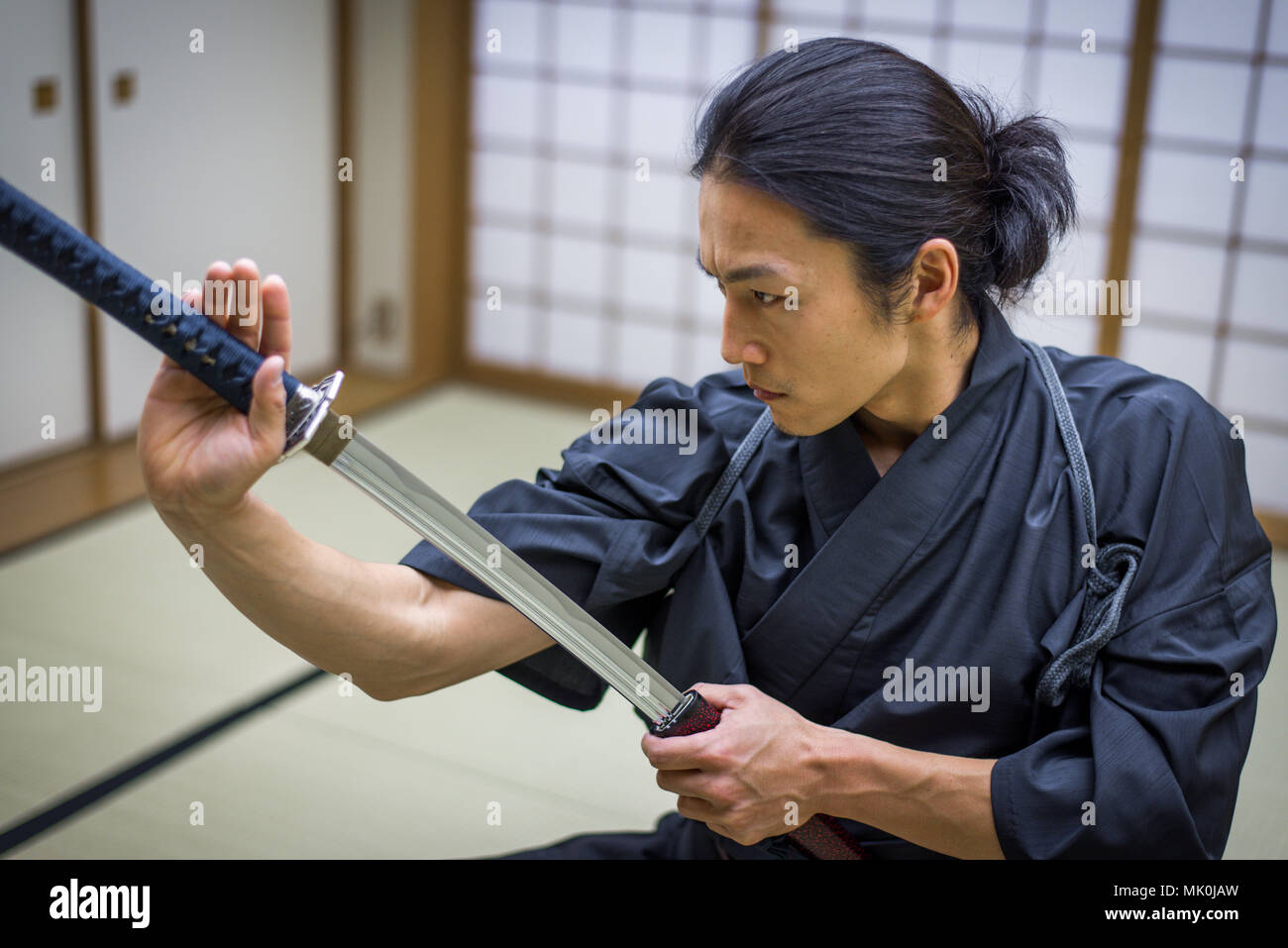 Japanese martial arts athlete training kendo in a dojo Samaurai