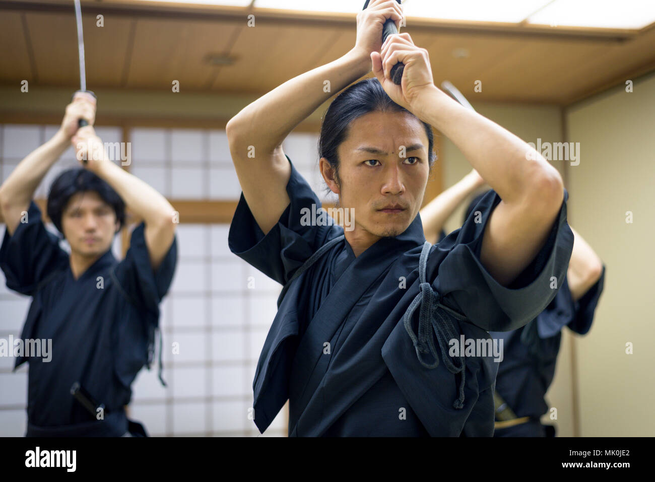Japanese martial arts athlete training kendo in a dojo Samaurai