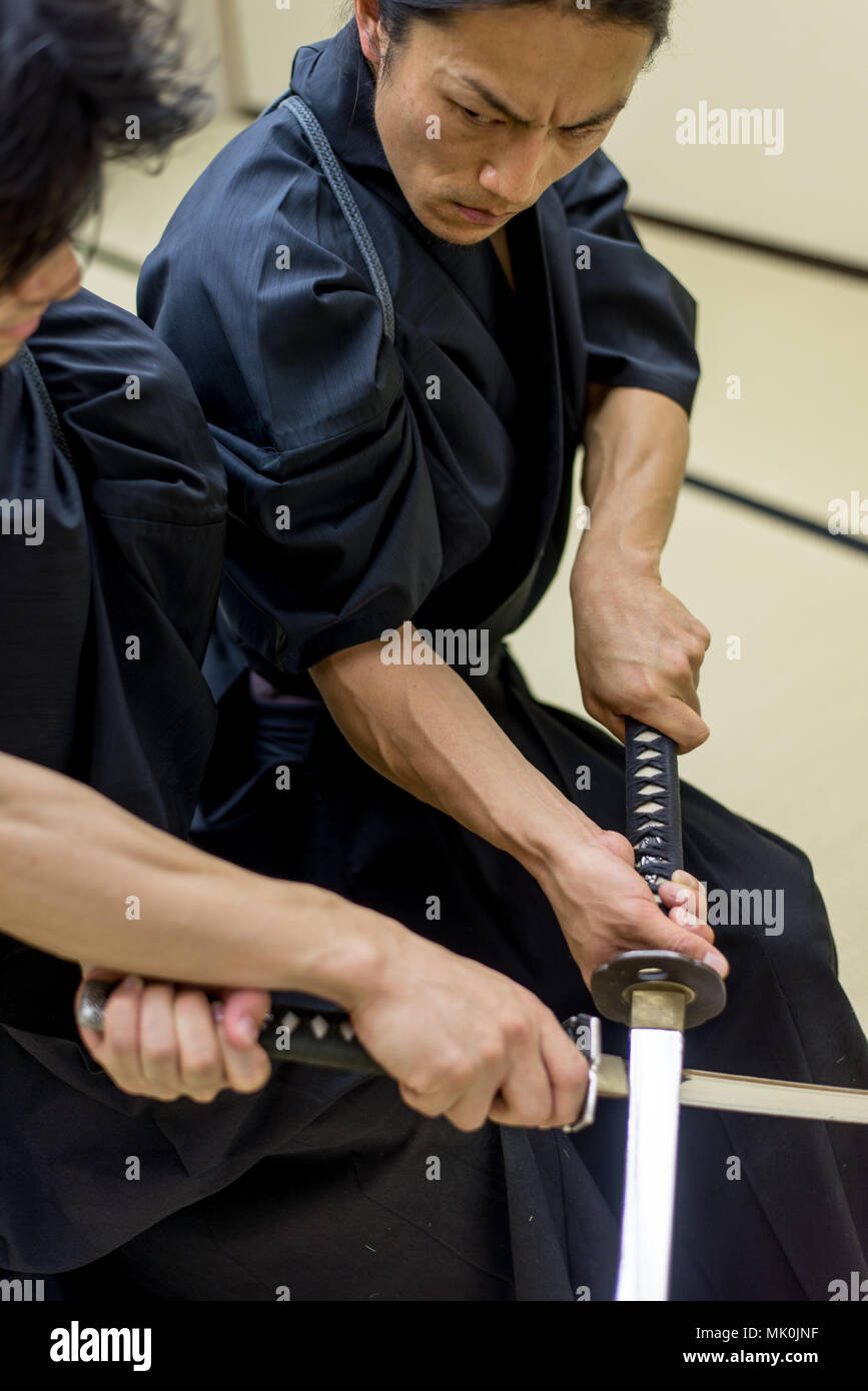 Japanese martial arts athlete training kendo in a dojo Samaurai