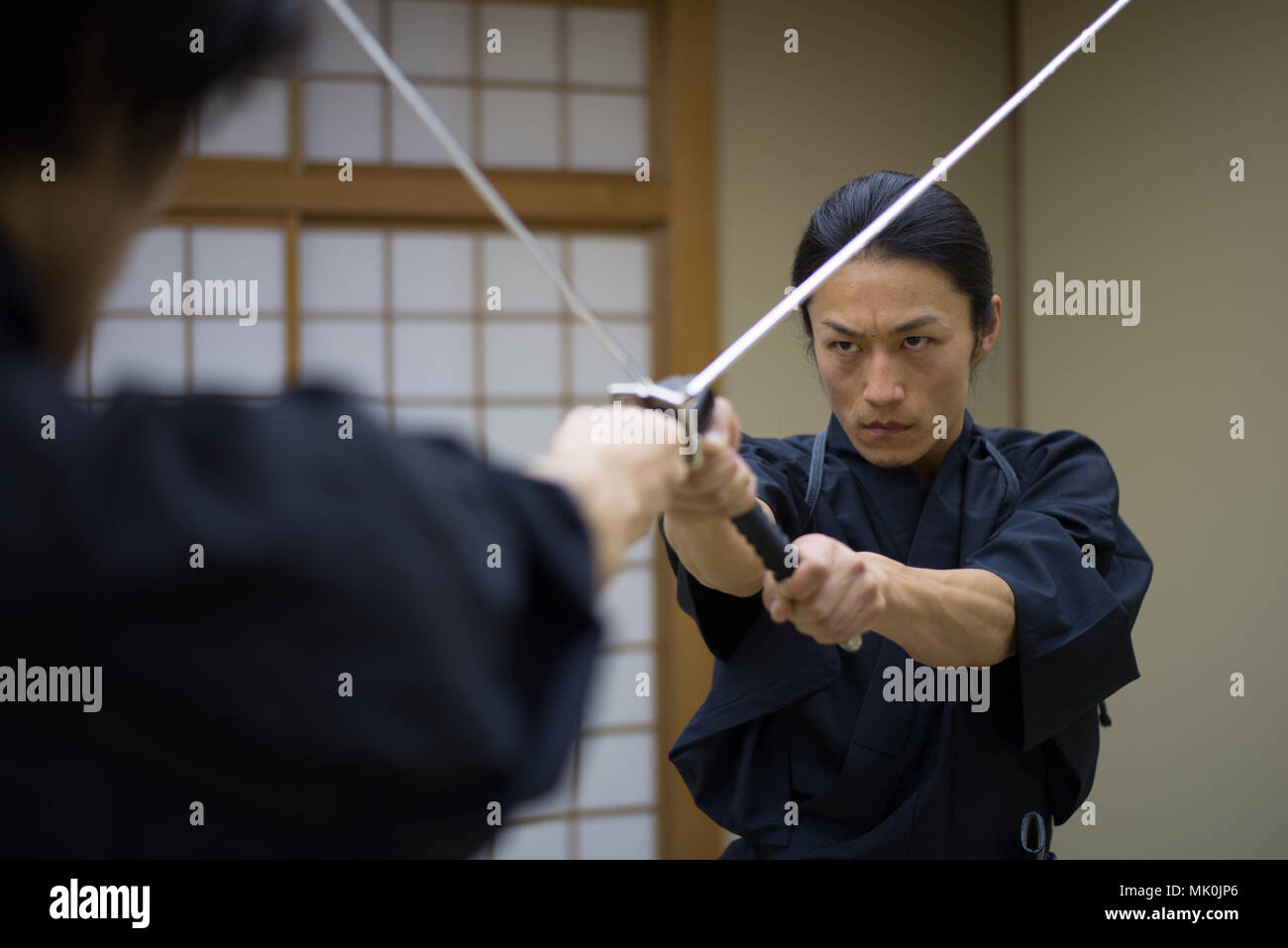 Japanese martial arts athlete training kendo in a dojo Samaurai