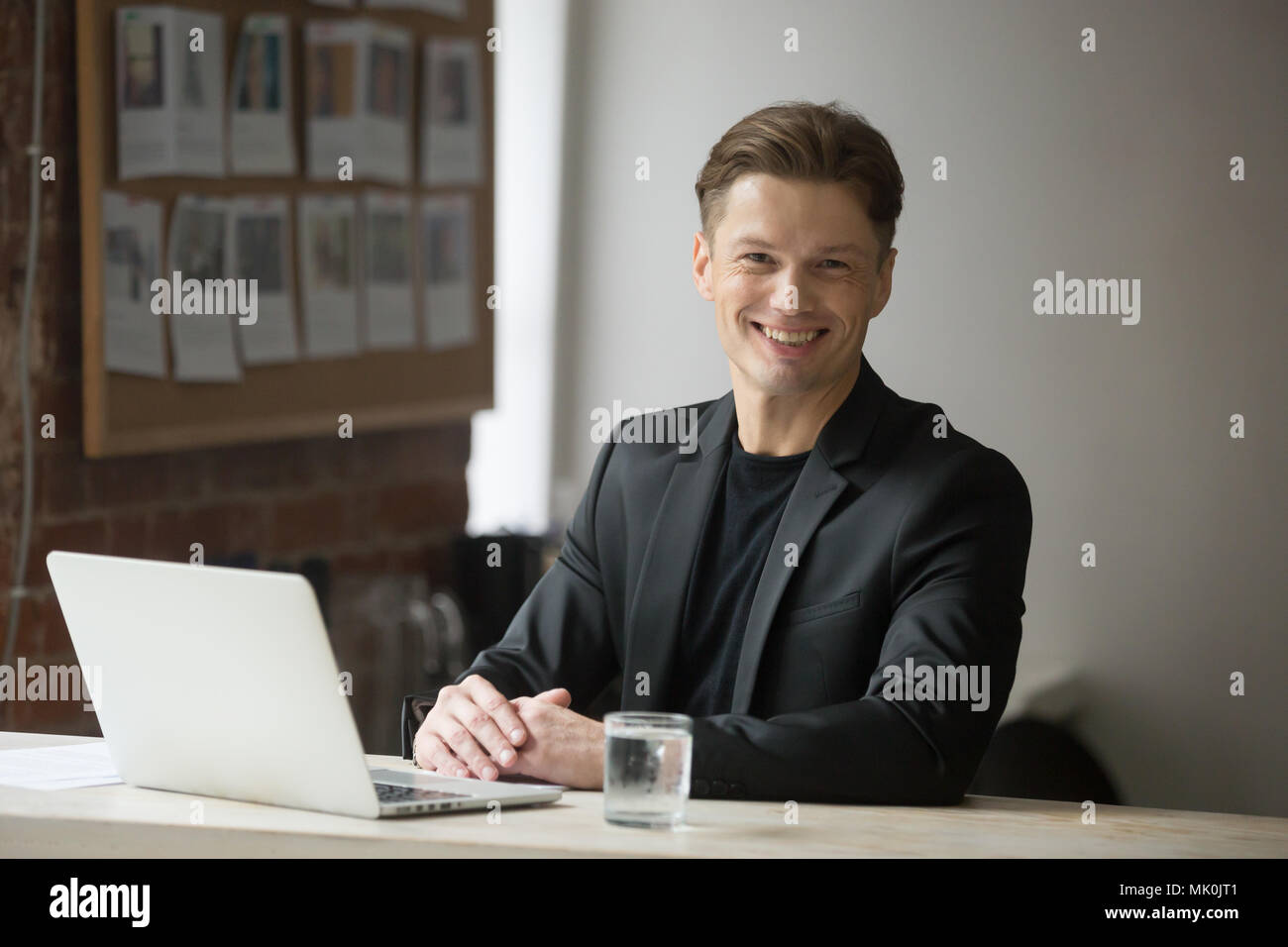 Confident CEO happy because of company success Stock Photo