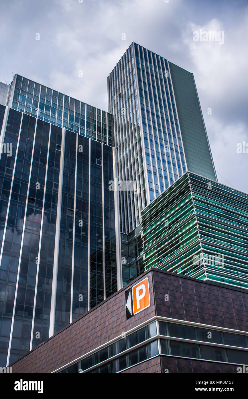 Close standing high modern glass office buildings.  Stock Photo