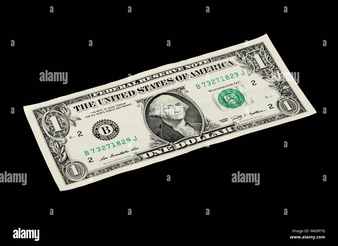One US dollar bill isolated on black background Stock Photo - Alamy