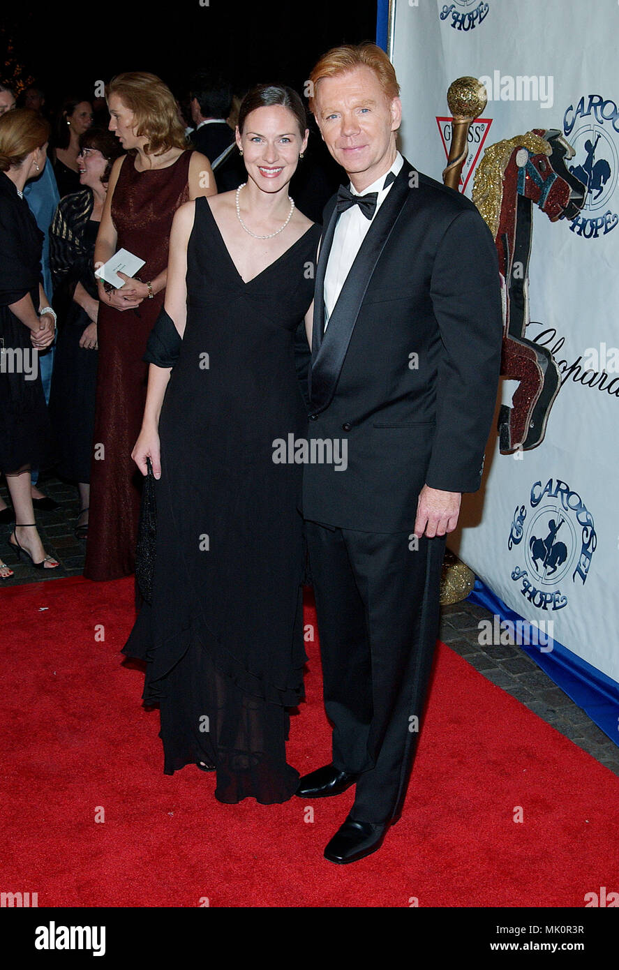 David Caruso and wife arriving at the Carousel of Hope which support the  Barbara Davis Center for Childhood Diabetesat the Beverly Hilton in Los  Angeles. October 15, 2002. - CarusoDavid wife65.JPG -