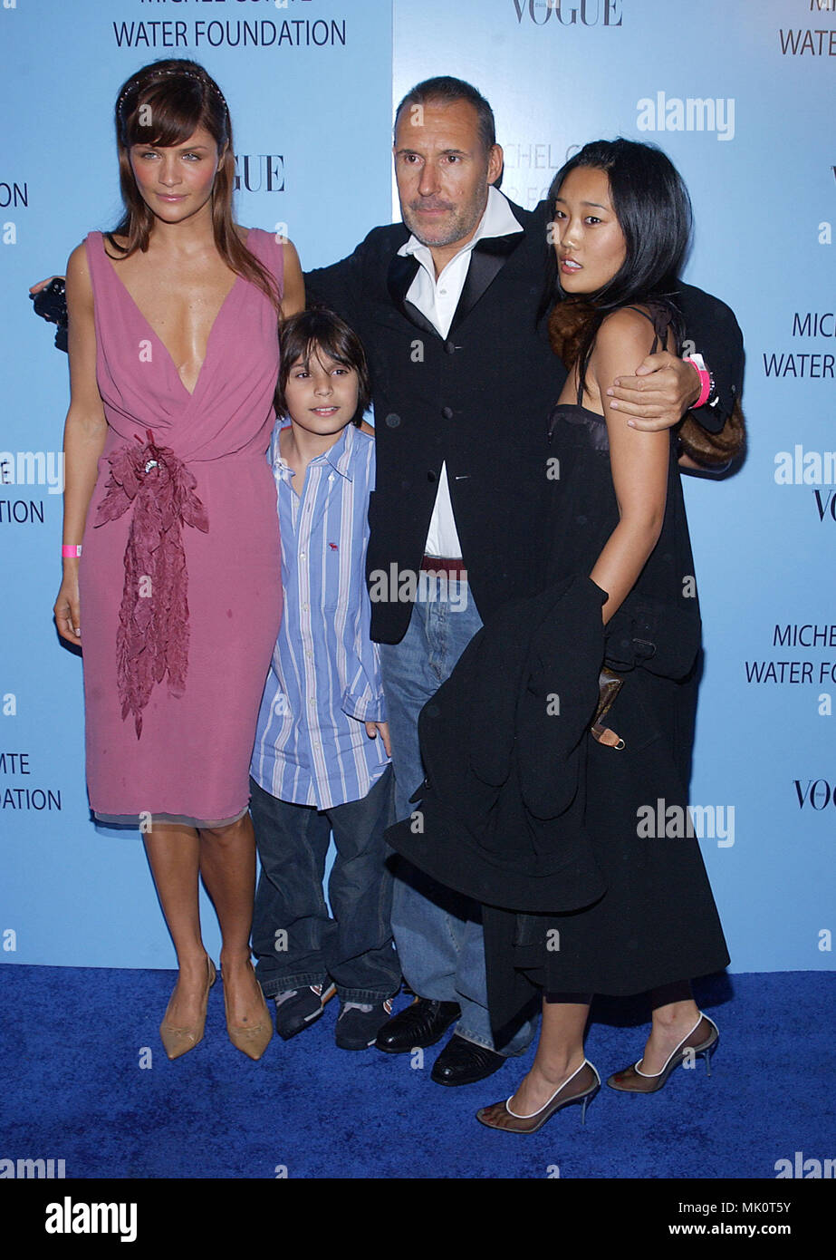 Michel Comte  with wife, son and Helena Christensen arriving at the Celebrity, fashion Photography and Philanthropy, Michl Comte Gala for the Water foundation at ACE Gallety in Beverly Hills, Los Angeles. February 25, 2004.          -            ComteMichel_Christensen013.JPG           -              ComteMichel_Christensen013.JPGComteMichel_Christensen013  Event in Hollywood Life - California,  Red Carpet Event, Vertical, USA, Film Industry, Celebrities,  Photography, Bestof, Arts Culture and Entertainment, Topix Celebrities fashion /  from the Red Carpet-, Vertical, Best of, Hollywood Life,  Stock Photo