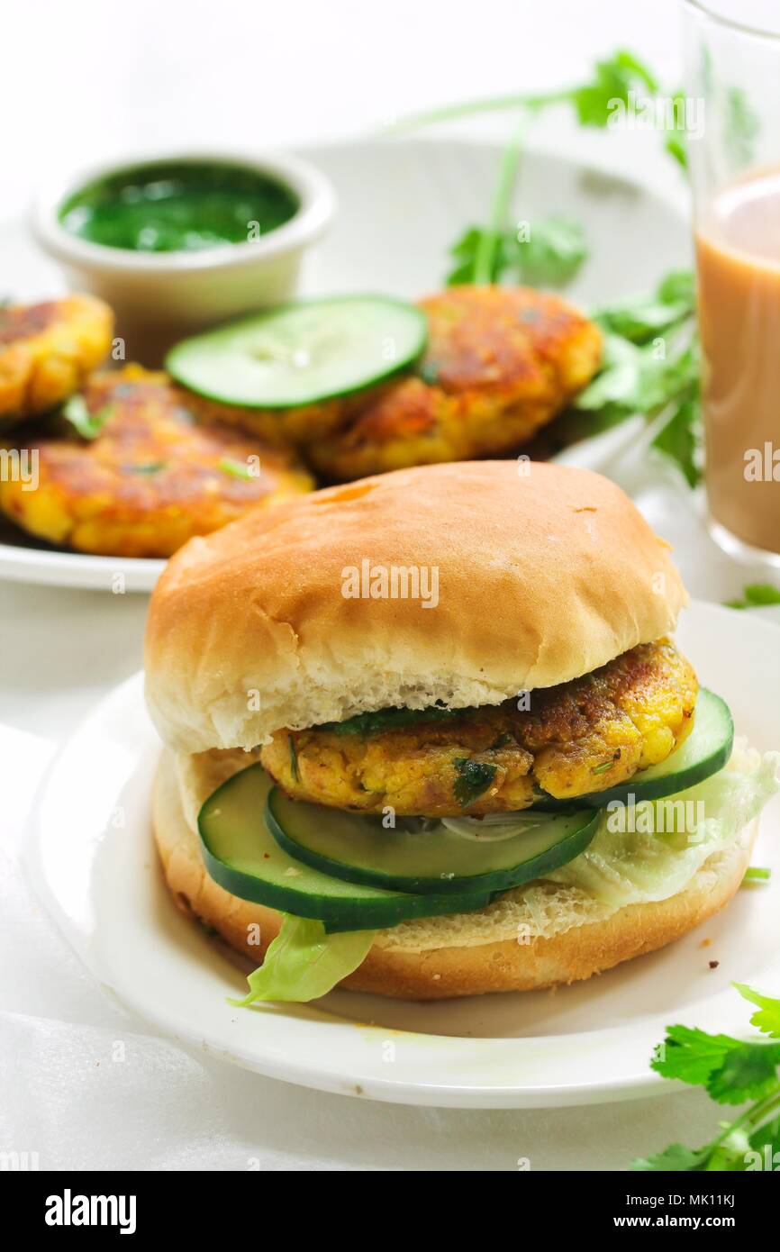 Vegetarian Alu Tikki Burger with potato Patties Stock Photo Alamy