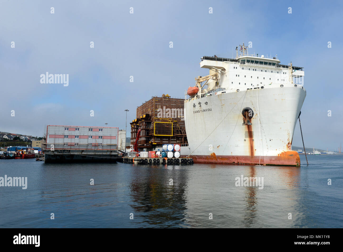 Heavy lifting vessel Xiang Yun Kou delivering a part of the Clair ridge project to the north sea and having it unloaded by submerging herself. Stock Photo