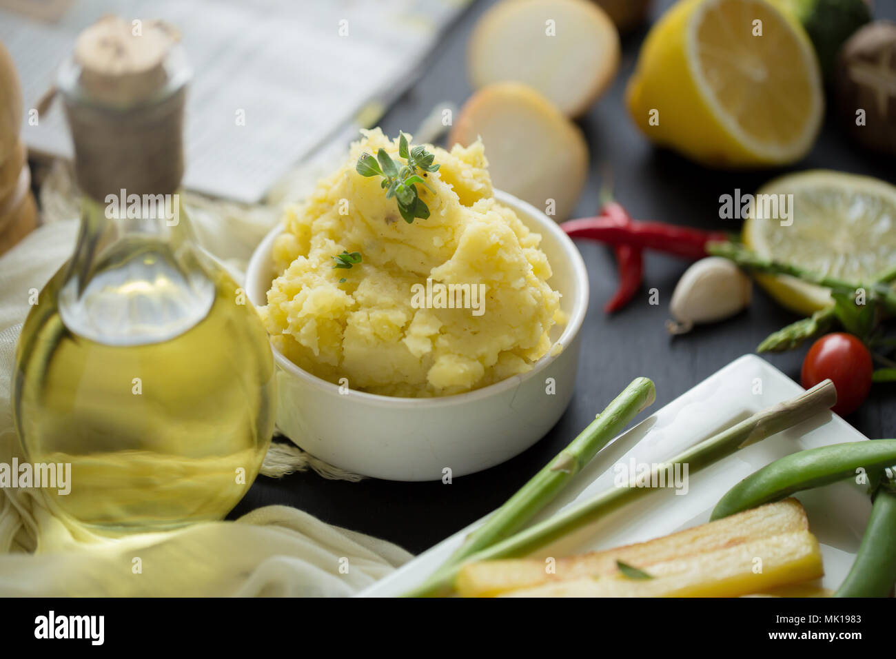 French fries and Mashed potato with spoon, in serving bowl Stock Photo