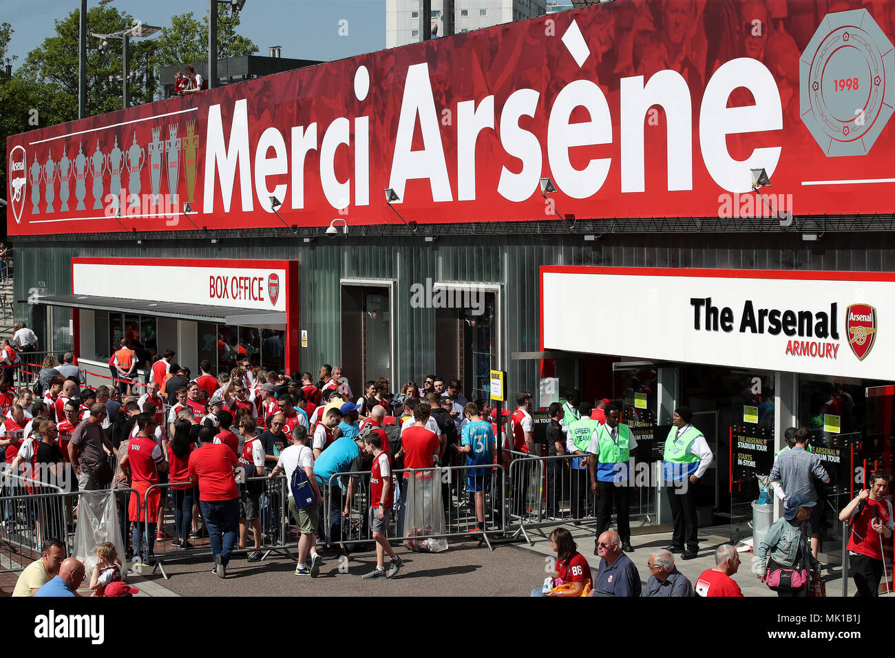 Arsenal fans queue for the ticket office and the club shop before the  Premier League match at the Emirates Stadium, London Stock Photo - Alamy