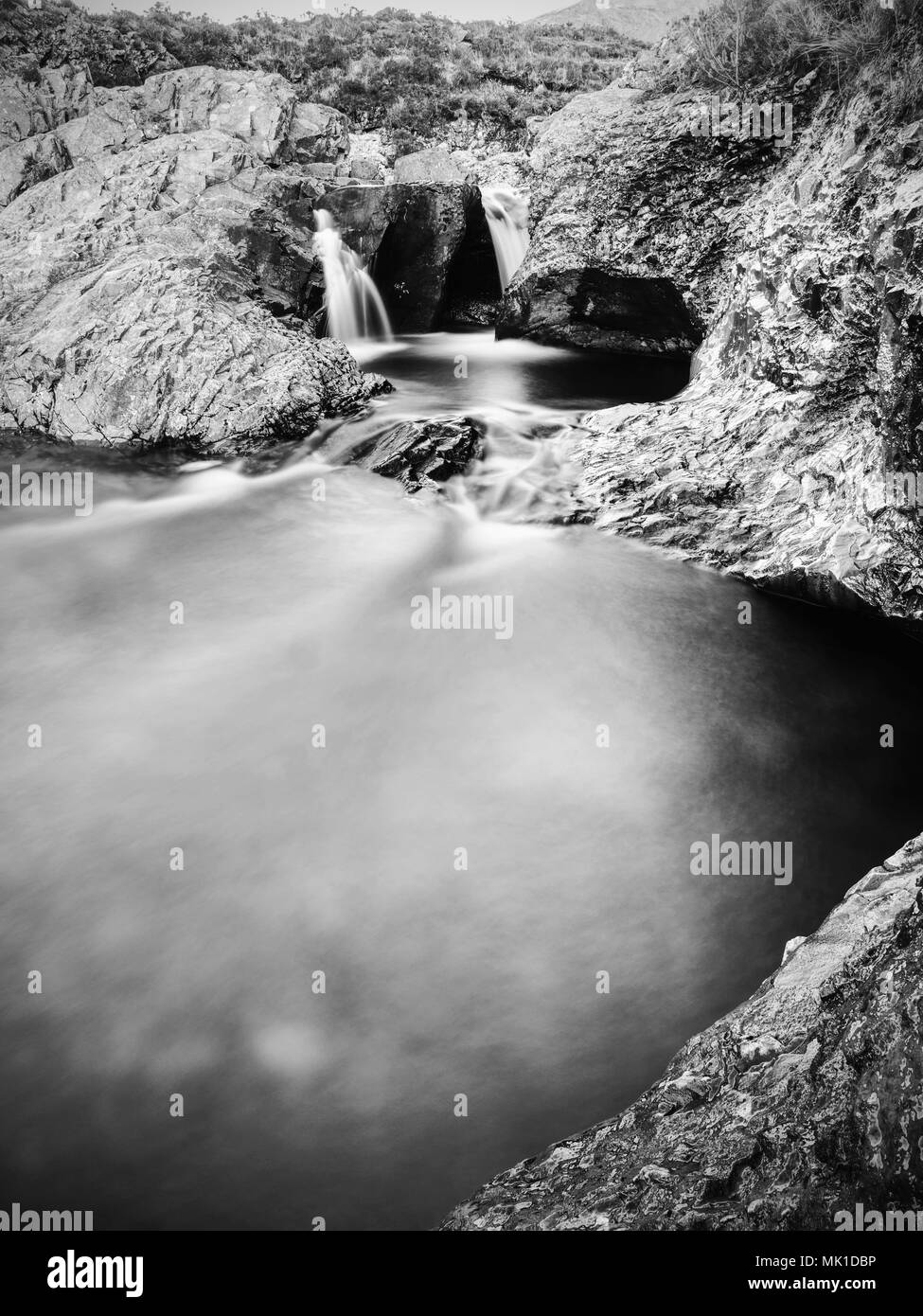 Multiple waterfalls on River Brittle  with many cold swimmable pools. Black and white photography Stock Photo