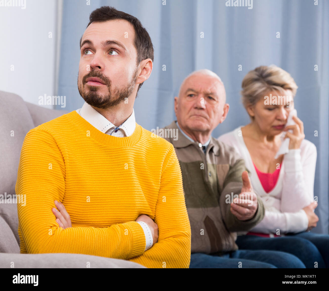 Mother and mature son and tension hi-res stock photography and images ...