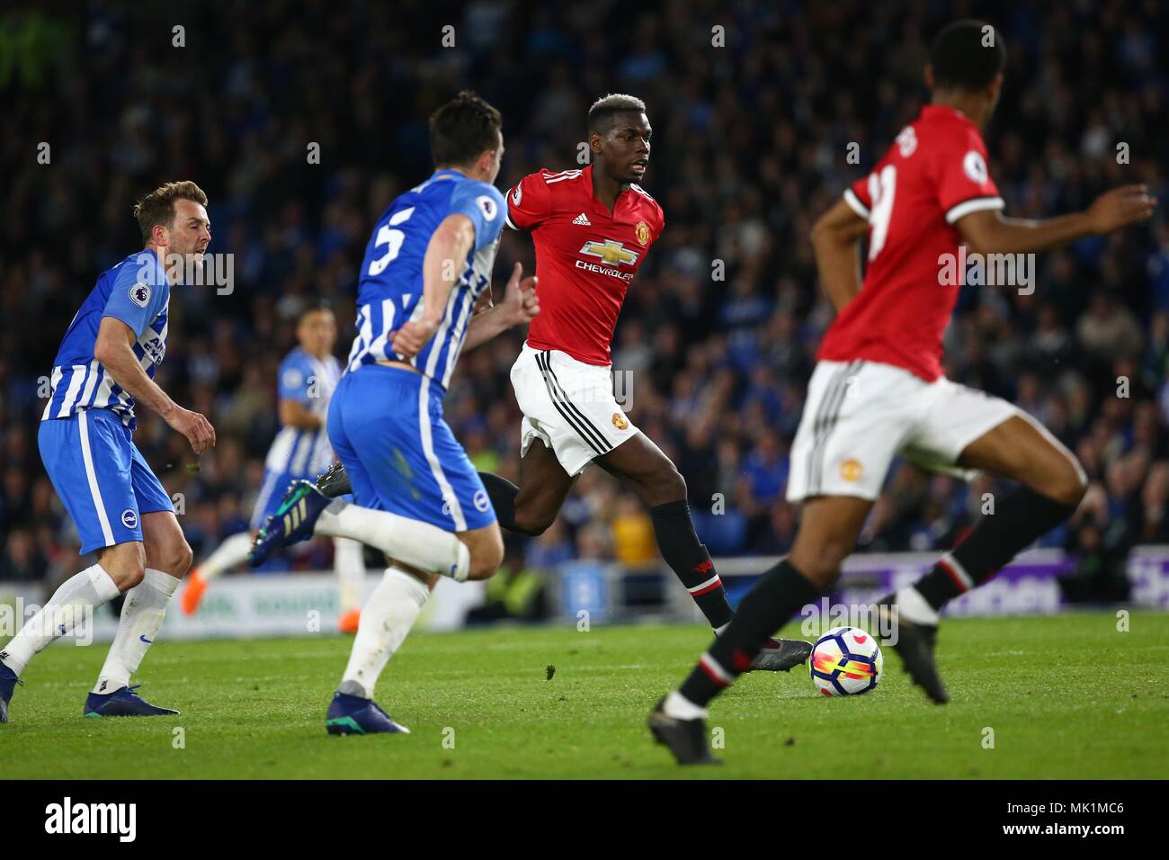 Paul Pogba of Manchester United during the Premier League match between Brighton and Hove Albion and Manchester United at the American Express Community Stadium in Brighton and Hove. 04 May 2018 *** EDITORIAL USE ONLY ***  No merchandising. For Football images FA and Premier League restrictions apply inc. no internet/mobile usage without FAPL license - for details contact Football Dataco Stock Photo