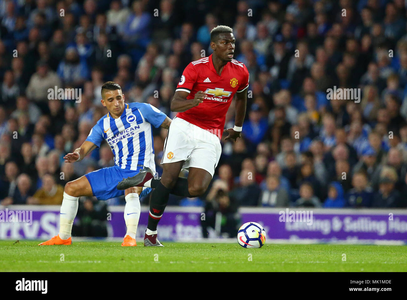 Paul Pogba of Manchester United during the Premier League match between Brighton and Hove Albion and Manchester United at the American Express Community Stadium in Brighton and Hove. 04 May 2018 *** EDITORIAL USE ONLY ***  No merchandising. For Football images FA and Premier League restrictions apply inc. no internet/mobile usage without FAPL license - for details contact Football Dataco Stock Photo