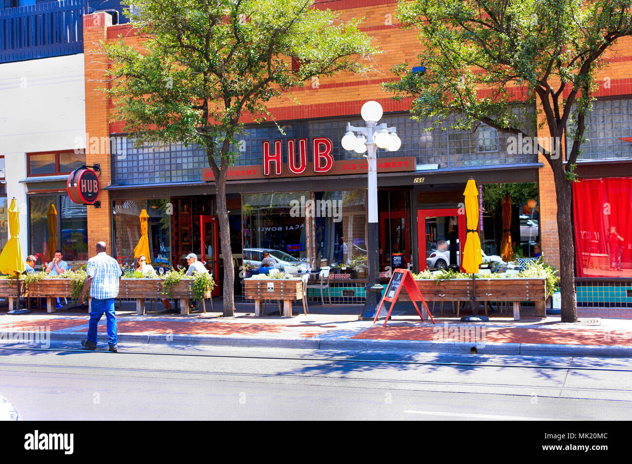 People outside the HUB Restaurant serving new American food on Congress