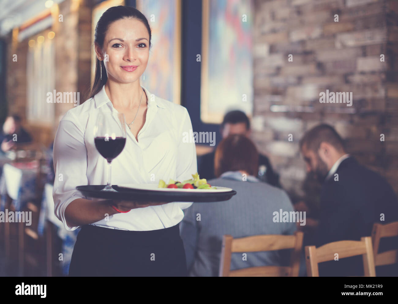 Hello Waitress Young positive waitress meeting hi-res stock photography and images - Alamy
