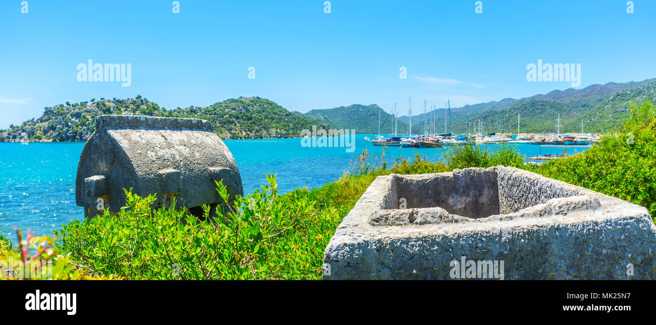 Kekova Bay is famous for archaeological sites with ruins, preserved from times of ancient Lycia, the area with stone Lycian tombs is located in Ucagiz Stock Photo