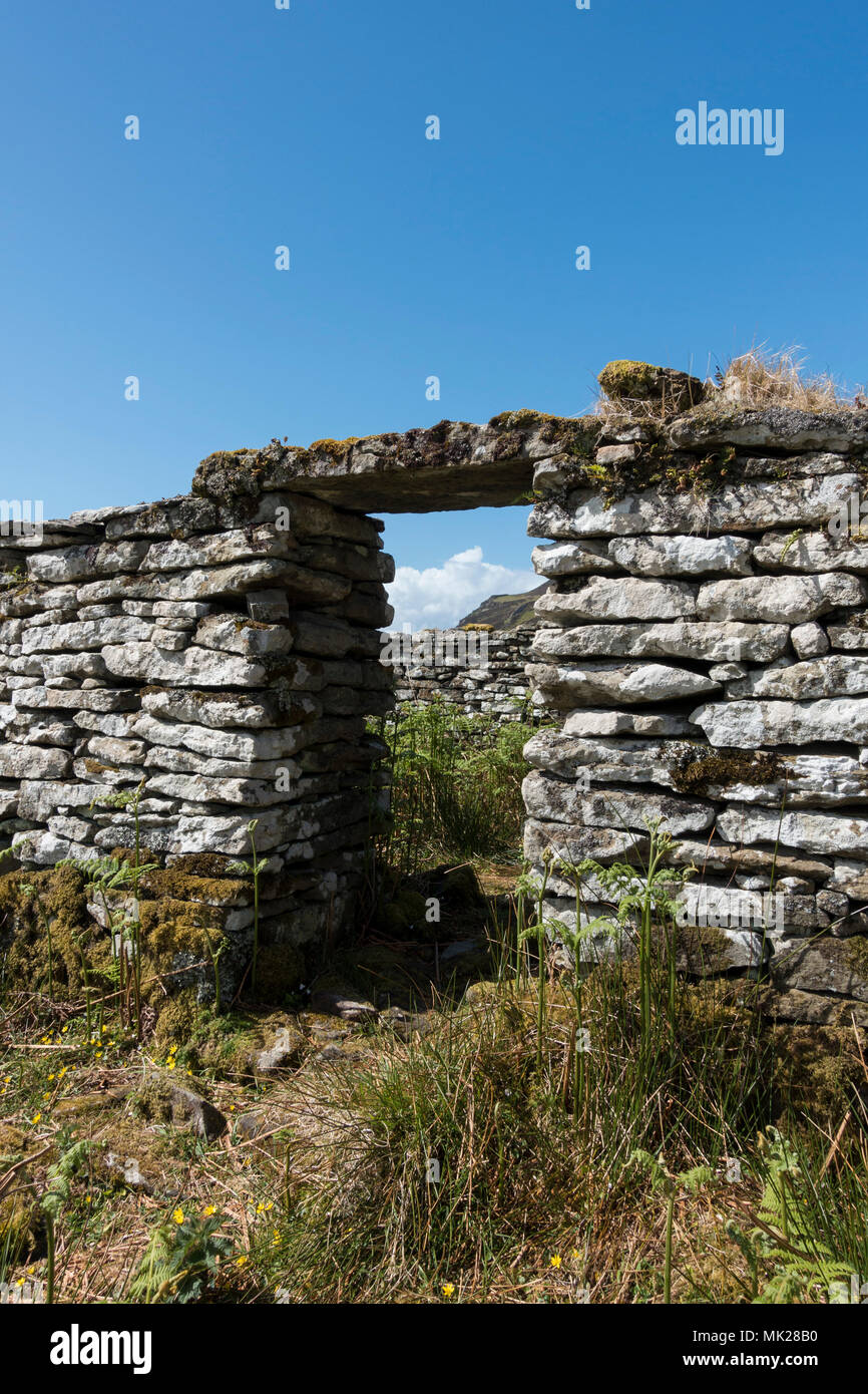 Ruin of old croft house in the deserted coastal village of Boreraig, Isle of Skye, Scotland, UK Stock Photo