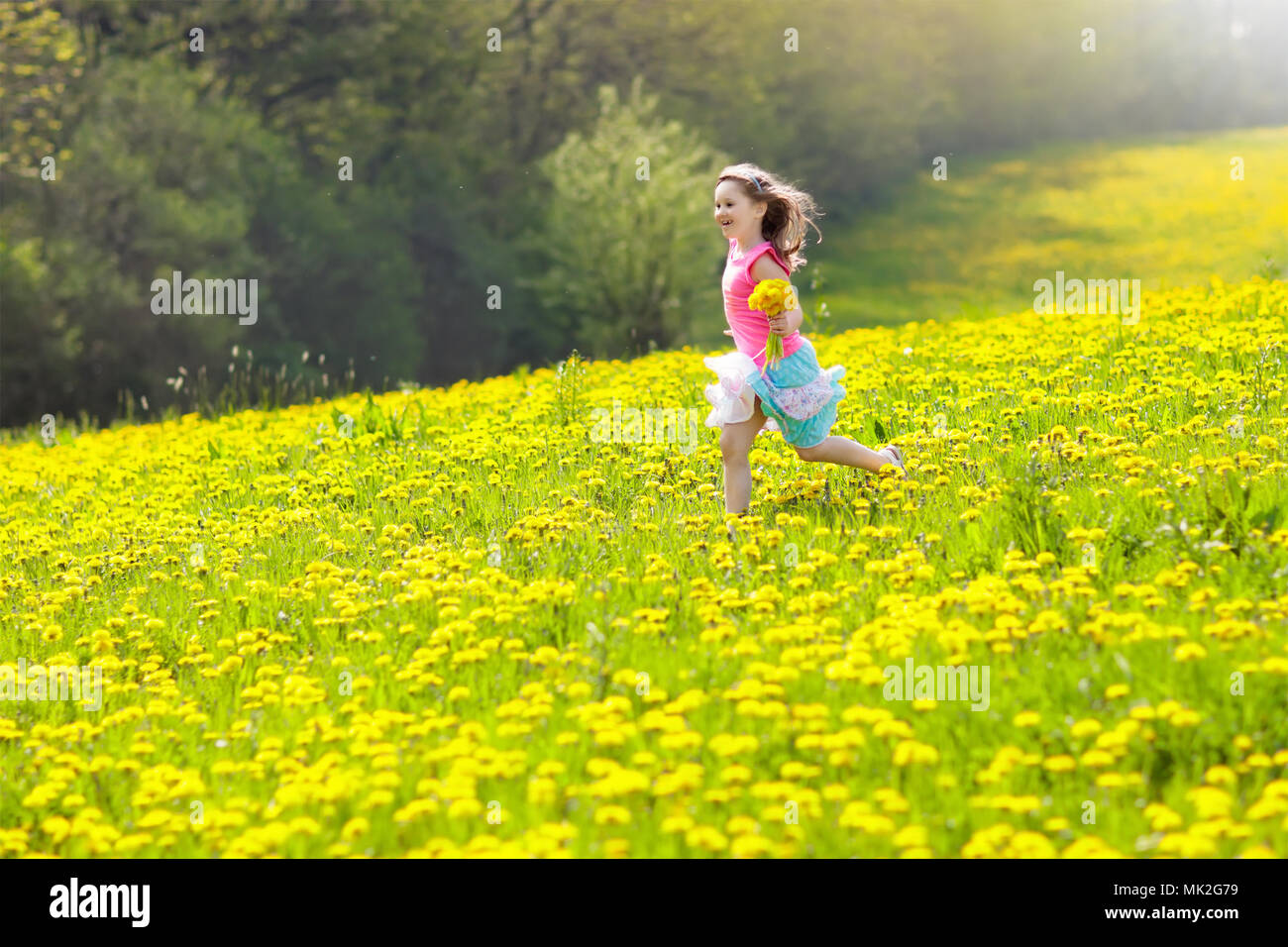 Children running in field flowers hires stock photography and images Alamy