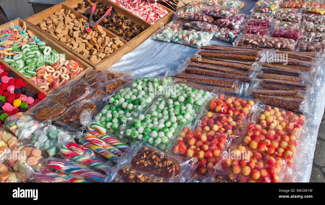 Various colorful sweets and sweets are on sale. Stock Photo