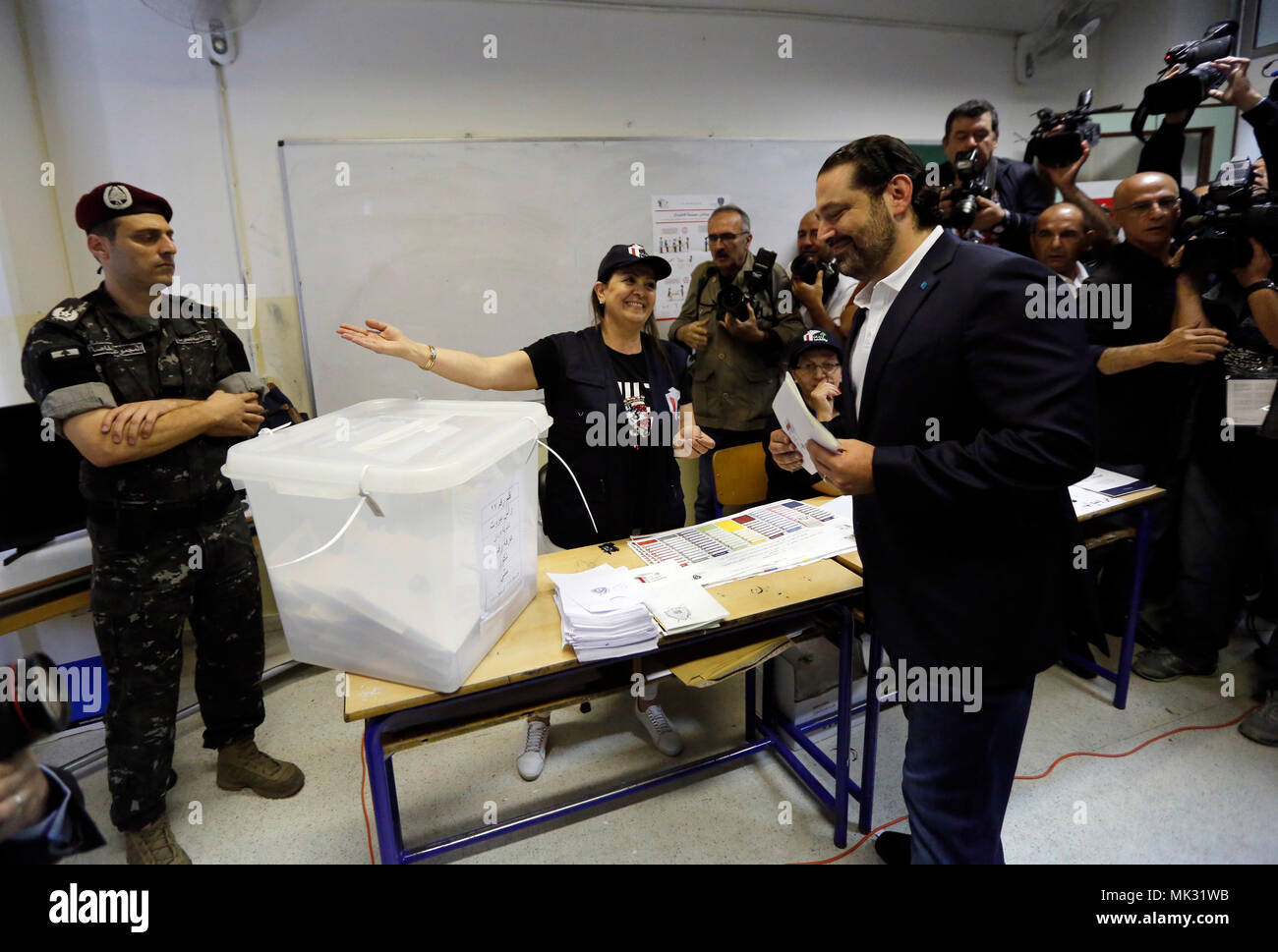 Beirut, Lebanon. 6th May, 2018. Lebanon's Prime Minister Saad Hariri votes at a polling station in Beirut, Lebanon, May 6, 2018. Some 3.7 million Lebanese people are registered to cast their votes in the parliamentary elections on Sunday, the first of their kind since the adoption of a new law that allows proportional representation. Credit: Bilal Jawich/Xinhua/Alamy Live News Stock Photo