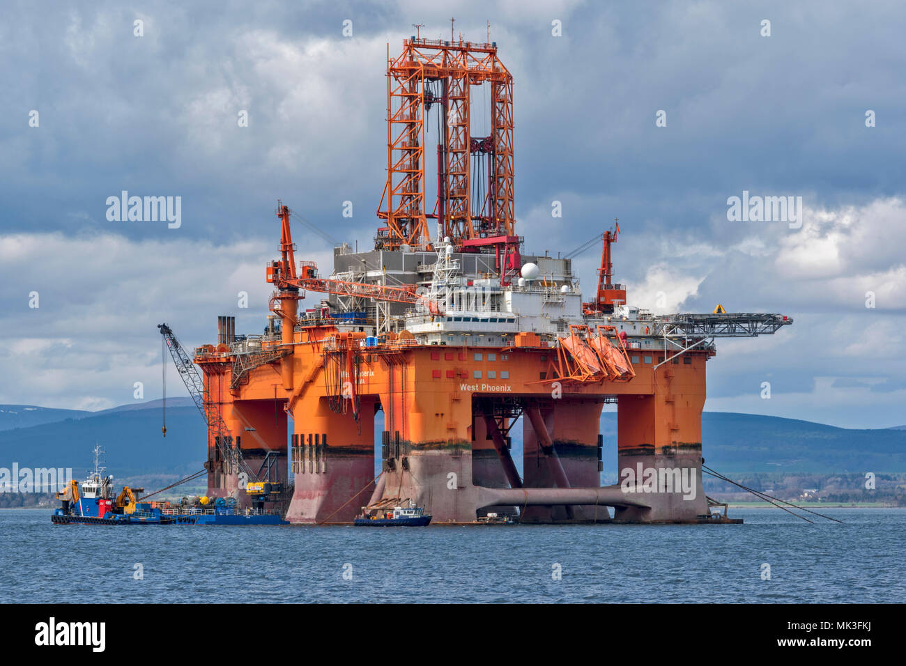 CROMARTY FIRTH SCOTLAND  DECOMMISSIONED OR REPAIRED OIL RIG WEST PHOENIX LYING OFF CROMARTY VILLAGE Stock Photo