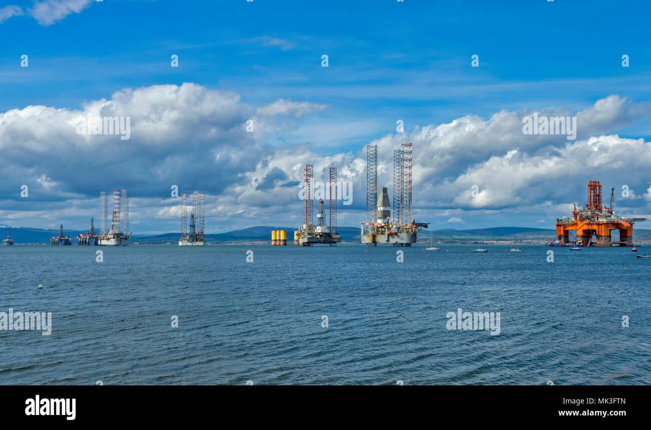 CROMARTY FIRTH SCOTLAND DECOMMISSIONED OIL RIGS OR BEING REPAIRED LYING OFF CROMARTY Stock Photo