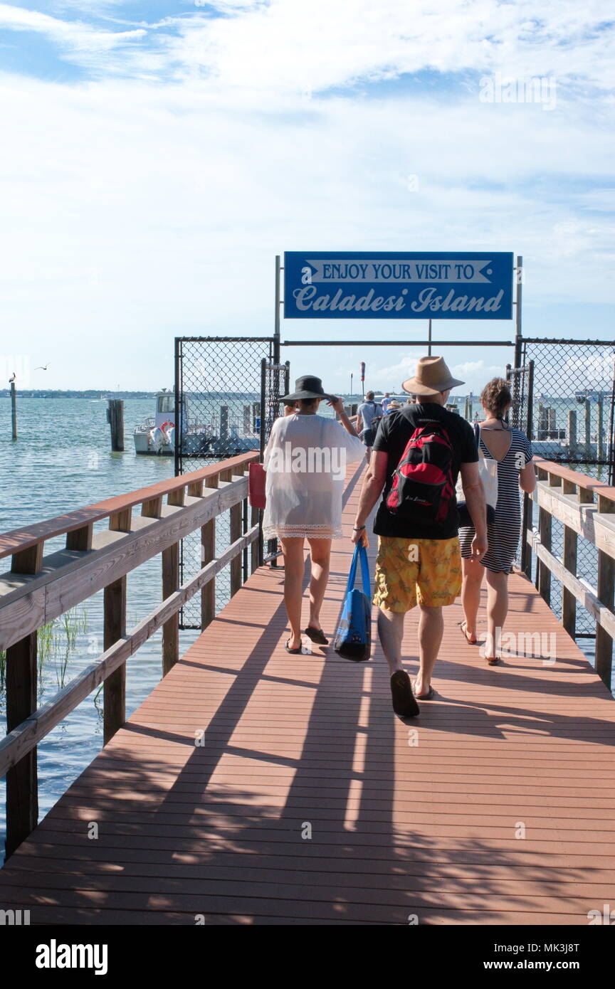 Ferry boat entrance for transportation to Caladesi Island, Florida which can only be reached by boat, Travelers boarding. Stock Photo