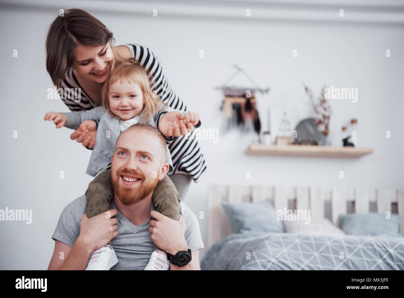 happy family mother, father, child daughter at home Stock Photo