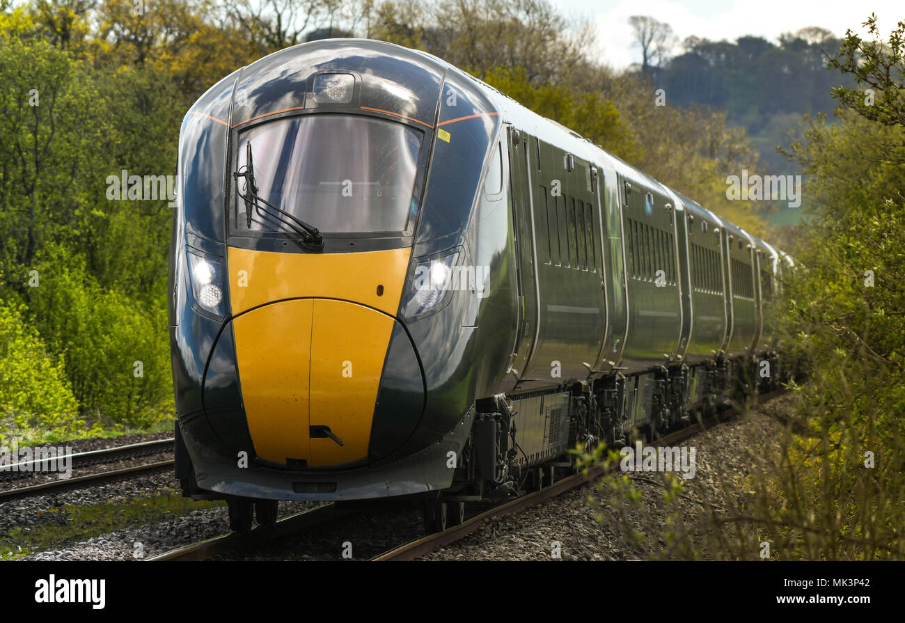New Great Western Railway electro diesel express train at speed on the main railway line near Cardiff, Wales Stock Photo