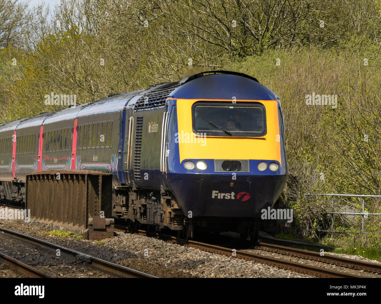 Inter city high speed diesel passenger train at speed on the main railway line near Cardiff Stock Photo