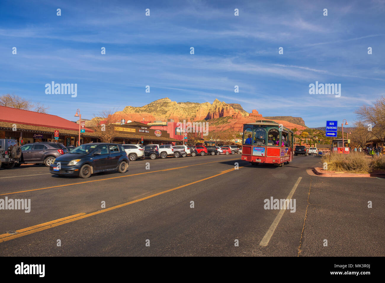 Main street of Sedona with trolley giving a city tour Stock Photo