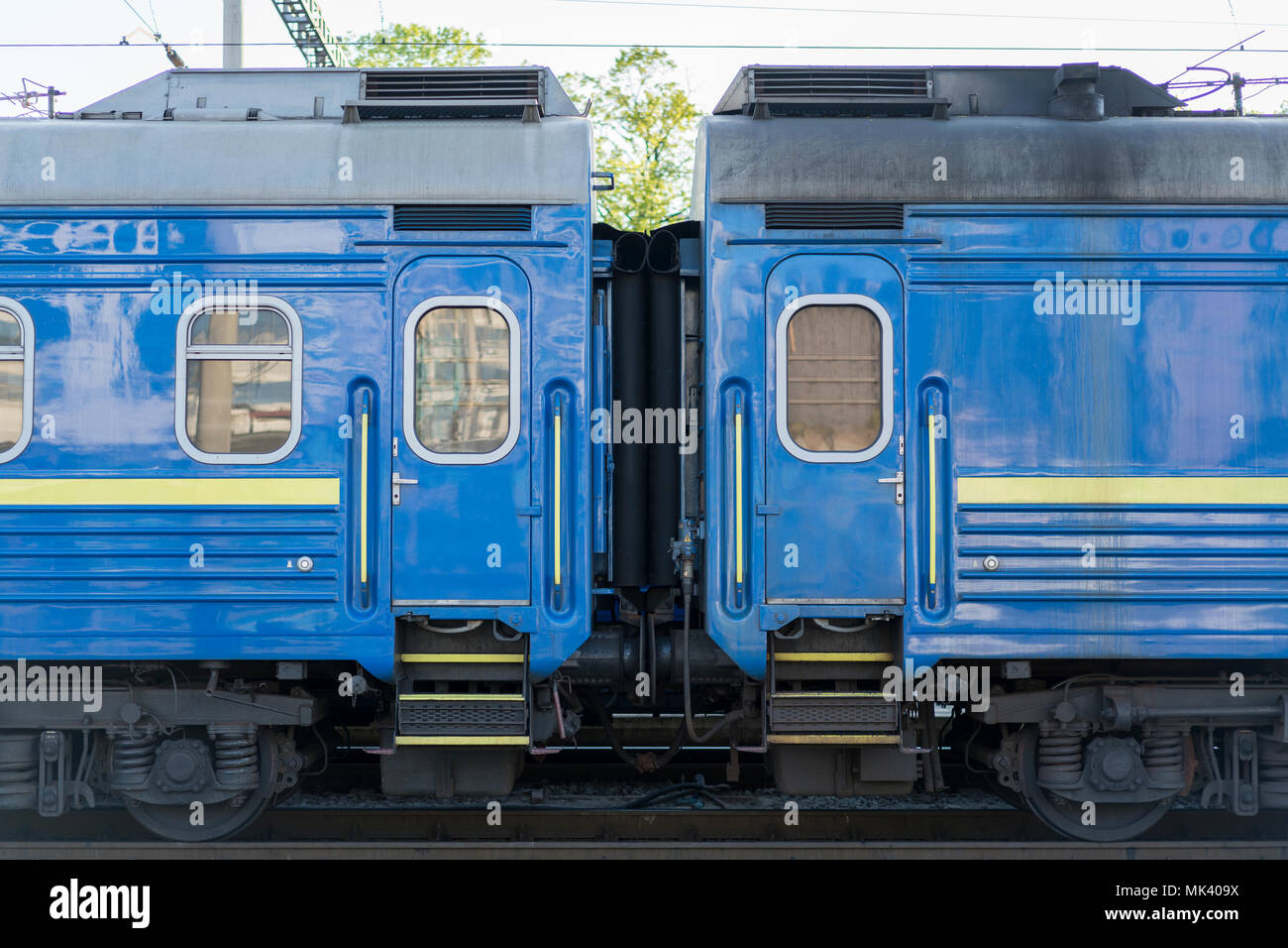 two blue passenger wagons Stock Photo Alamy