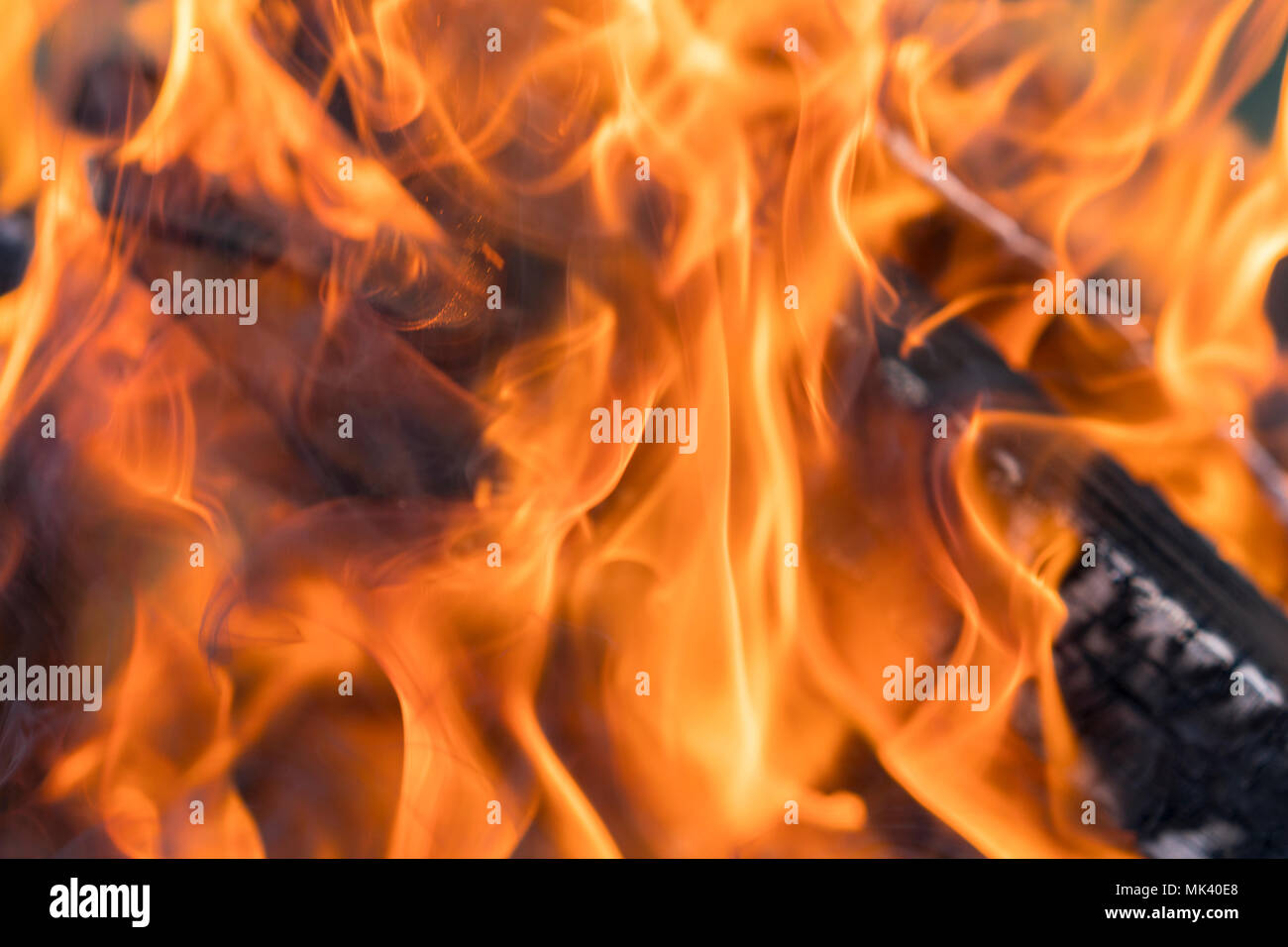 Burning Firewood Red Yellow Fire In The Fireplace Close Up