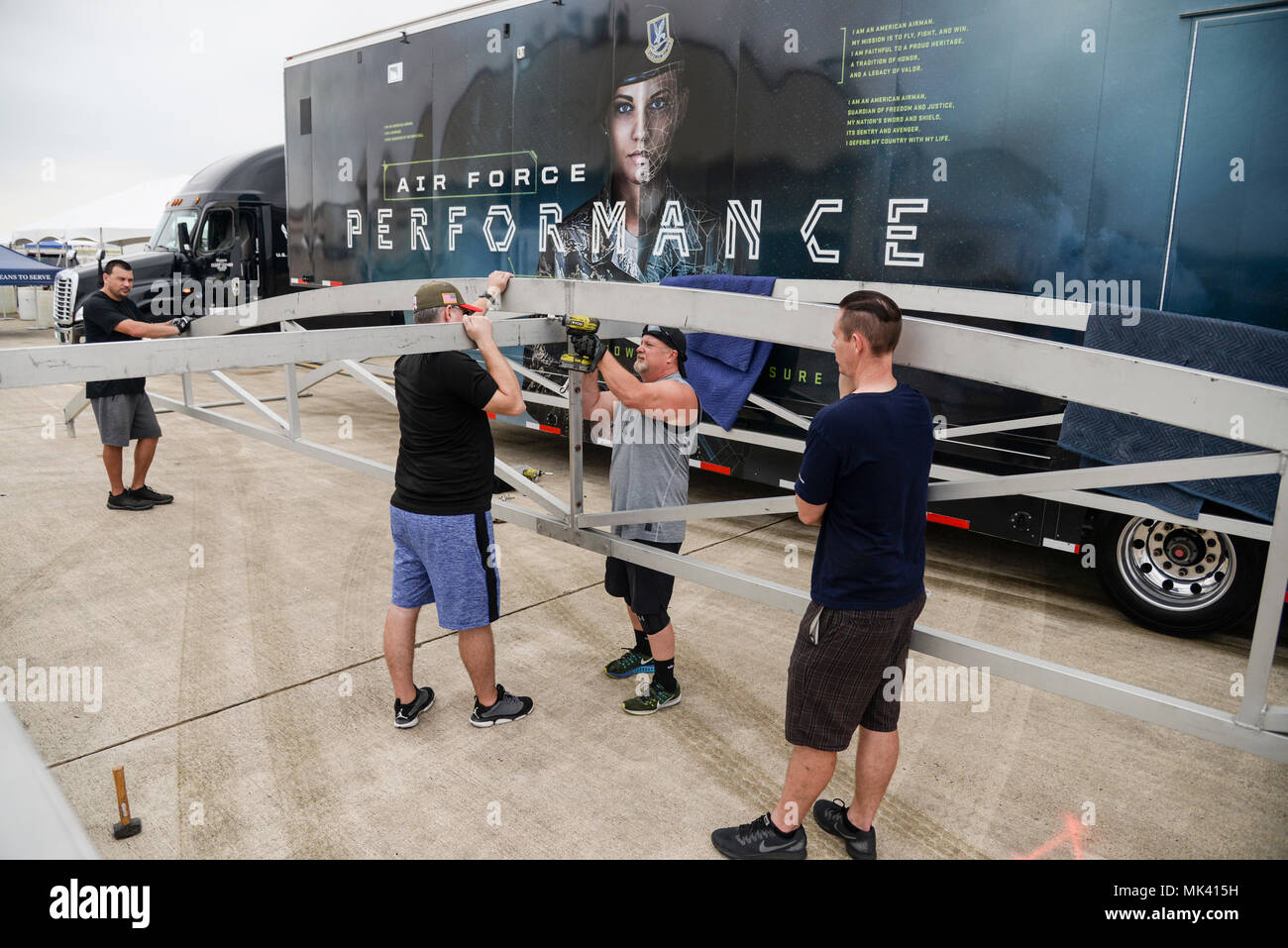 Members of the U.S. Air Force Performance demonstration team set up a ...