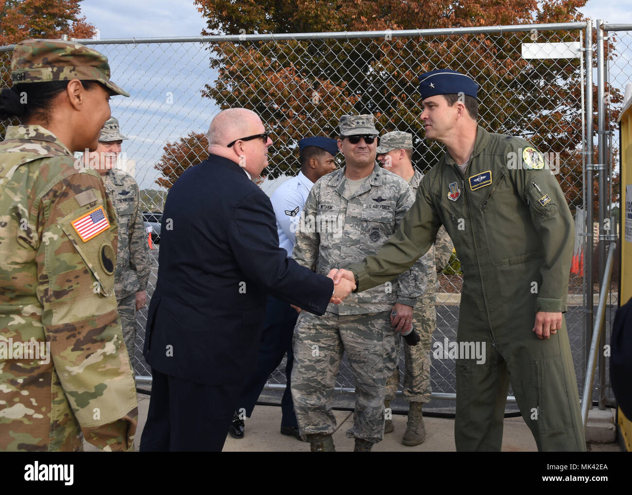 Gen. Randolph Staudenraus welcomes Maryland Gov. Larry Hogan to the 175th Cyberspace Operations Squadron groundbreaking ceremony Nov. 2, 2017 at Fort George G. Meade, Maryland. Hogan was the keynote speaker at the even that marked the initial construction of the structure that will provide closer integration between the ANG and U.S. Cyber Command. (U.S. Air National Guard photo by Senior Airman Enjoli Saunders) Stock Photo