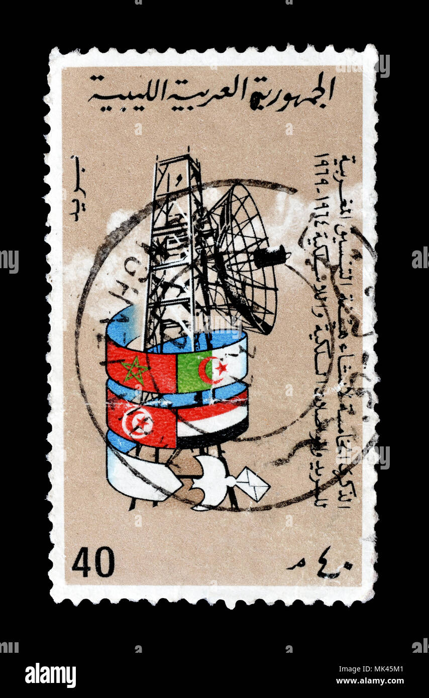 Cancelled postage stamp printed by Cameroon, that shows Radar and national flags , circa 1970. Stock Photo