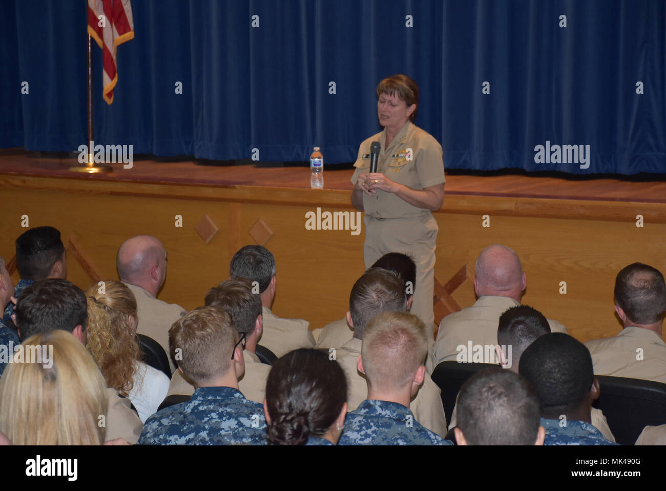 STENNIS SPACE CENTER, Miss.  Vice Adm. Jan Tighe, Vice Chief of Naval Operations for Information Warfare and Director of Naval Intelligence, responds to a question at an All Hands call with Naval Oceanography assets at Stennis Space Center. (U.S. Navy photo by George Lammons) Stock Photo