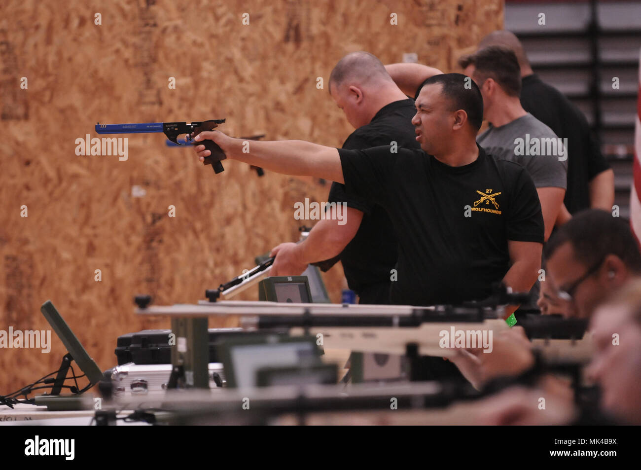 Soldiers and veterans compete in the shooting competition at the
